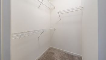 The hendrix apartments in atlanta primary bedroom closet with shelving